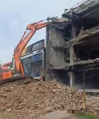 Lucknow Fire Tragedy: Bulldozer razes illegal Aliganj building responsible for 15 deaths; major action by LDA.